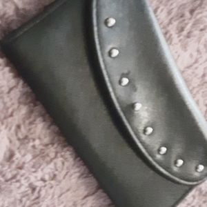 A small black hand bag